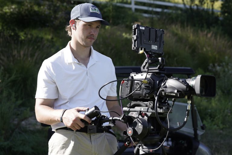 CGN+ camera operator with a broadcast camera rig