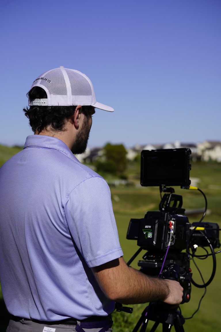 Camera operator following play
