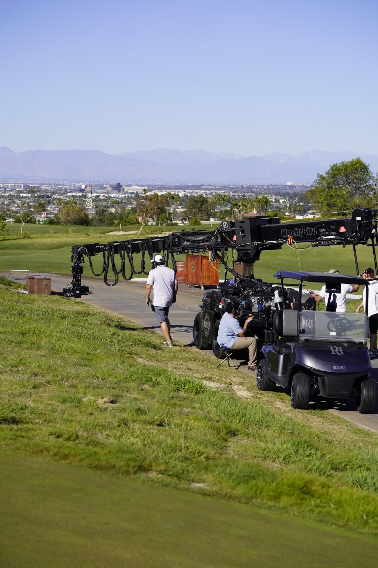 Camera jib and crew alongside the fairway