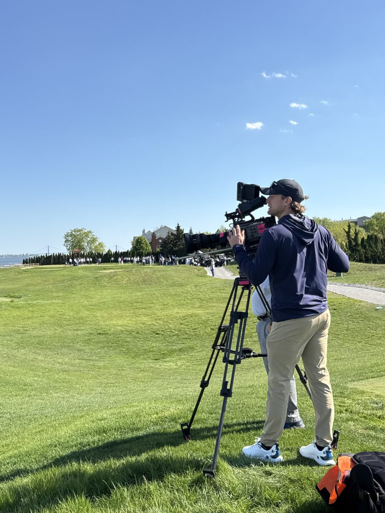 Camera operator setting up a shot