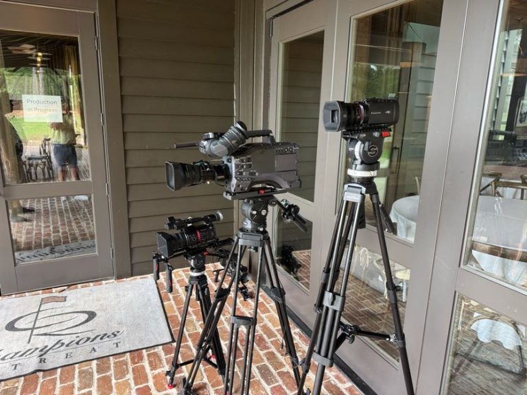 Broadcast cameras staged at the clubhouse